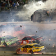 Illustration for article titled Terrifying Fan Video Shows NASCAR Race Car Crashing Into Catch Fence